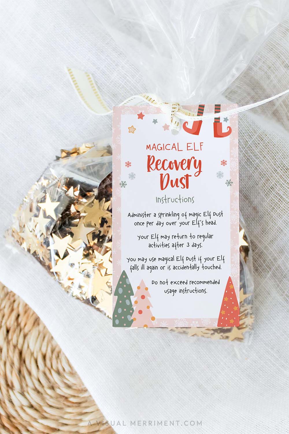 vertical girl elf on the shelf touched magic dust gift tag tied to bag of glitter sparkles