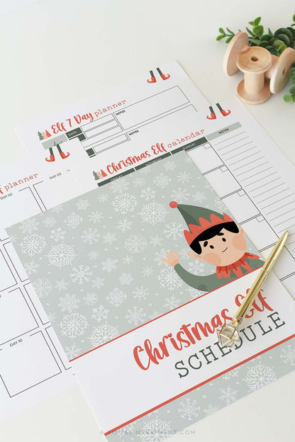 Vertical green christmas elf planner schedule pages laid out with gold pen
