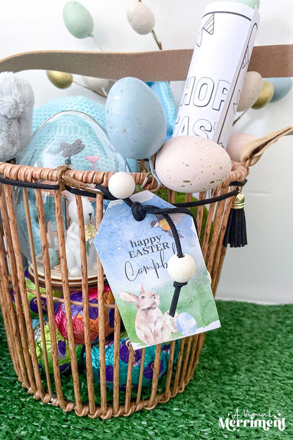 filled easter basket with happy easter gift tag tied to it