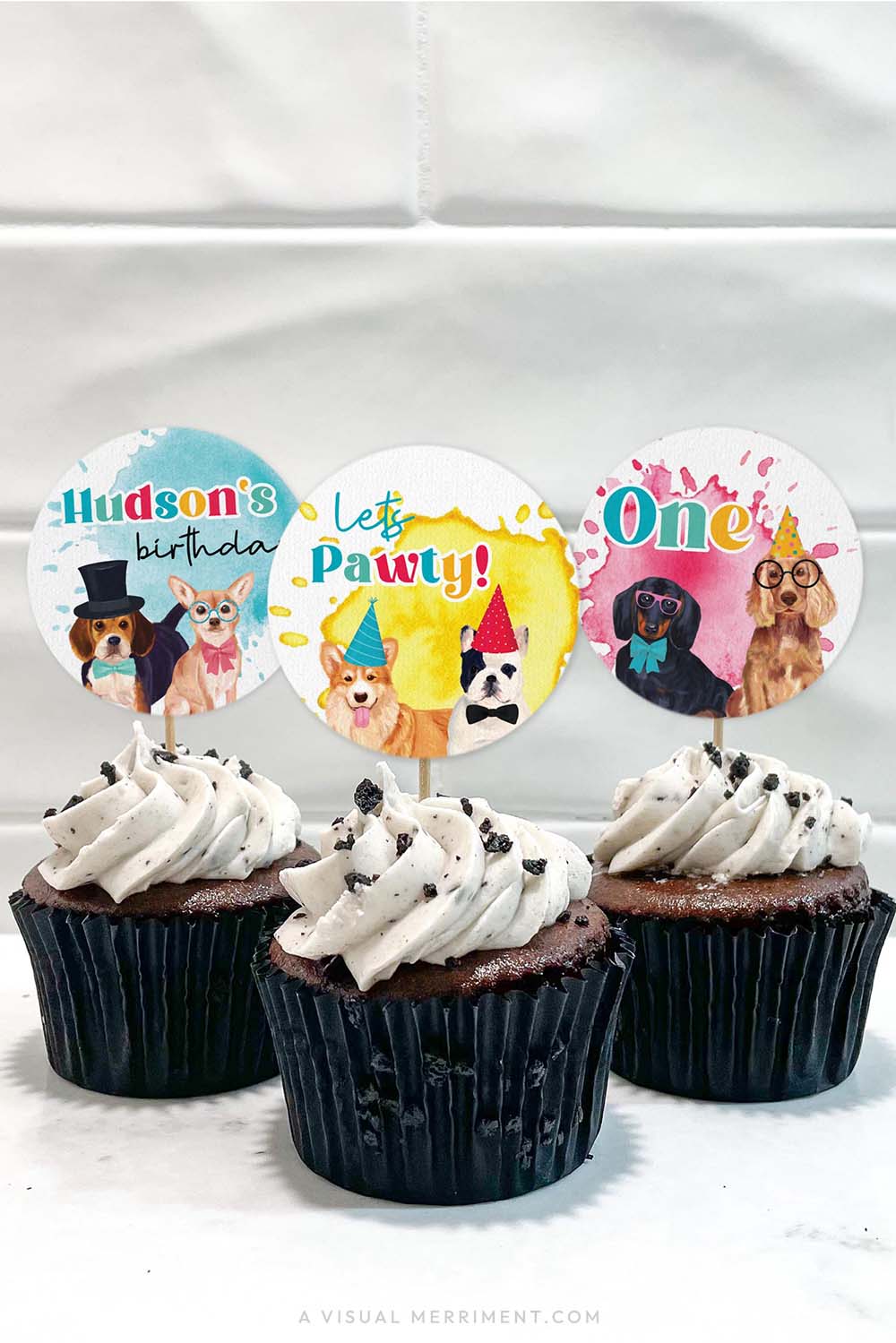 vertical of 3 cupcakes with party dog printable cupcake toppers circles in cakes