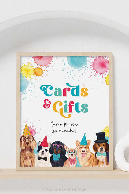 colorful cards and gifts dog party sign with in a frame sitting on a shelf