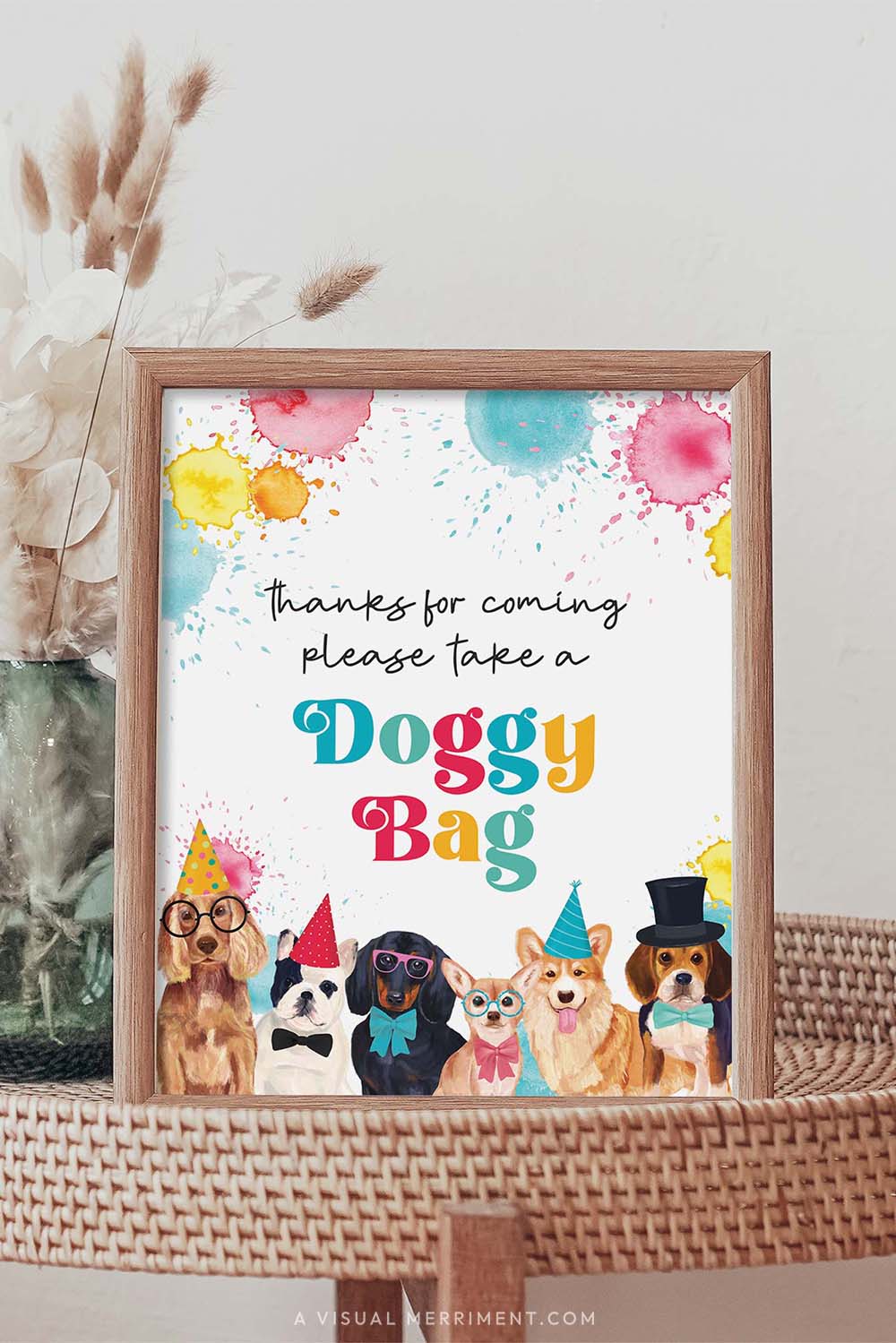 Please take a doggy bag dog printable party sign in a frame sitting on a grass table with a vase of boho stems