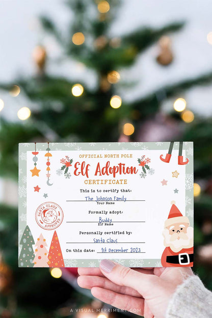 vertical hand holding elf on the shelf adoption certificate paper