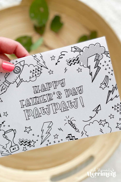 Vertical of Hand holding kids happy father’s day Pawpaw printable coloring card