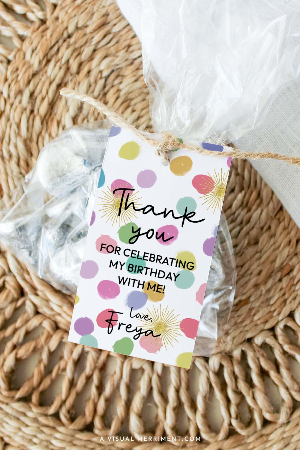 editable gift tag template with colorful confetti polka dots attached to bag of treats