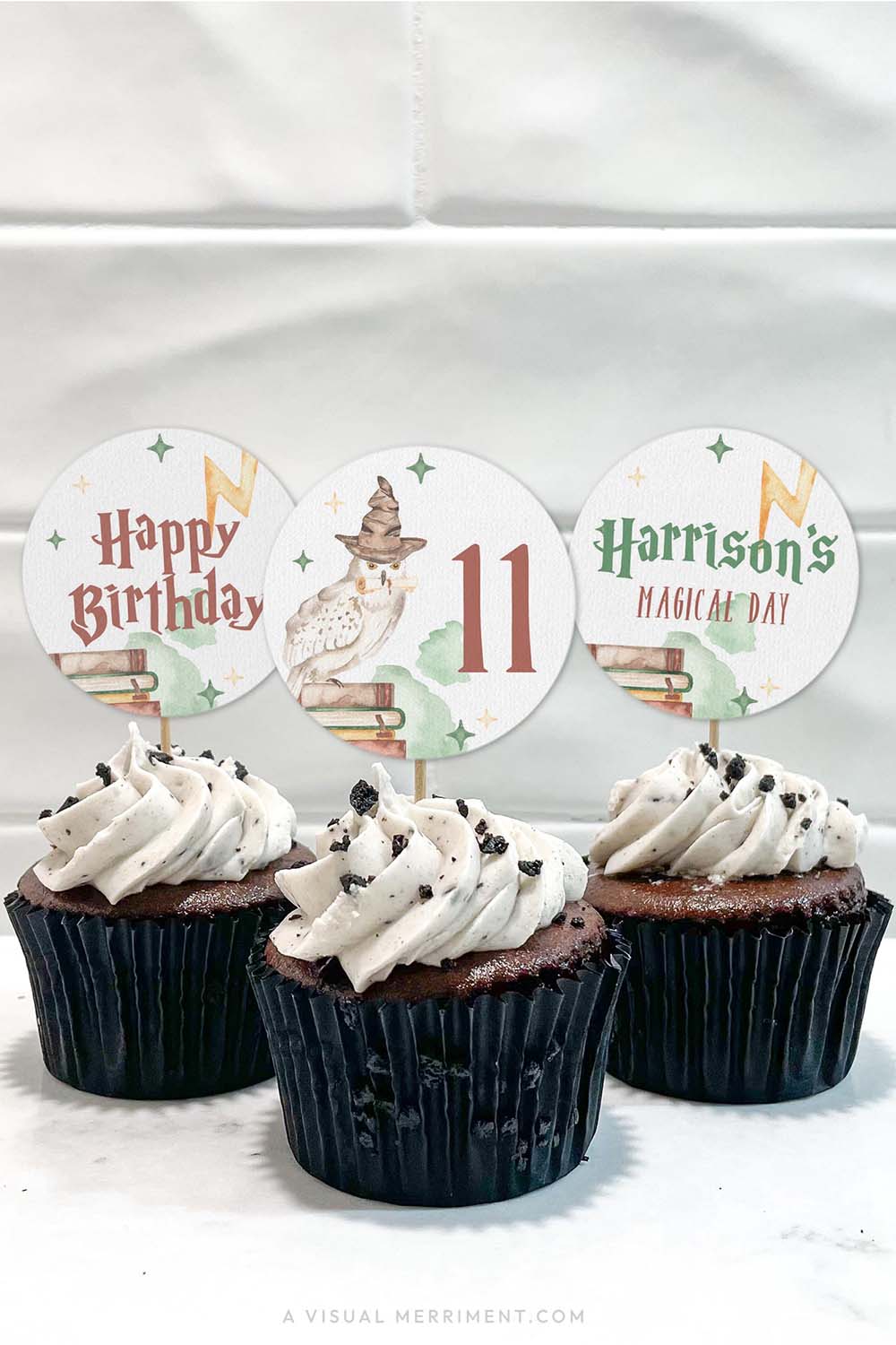 Vertical of cupcakes with harry potter style printable cupcake topper circles with magic elements