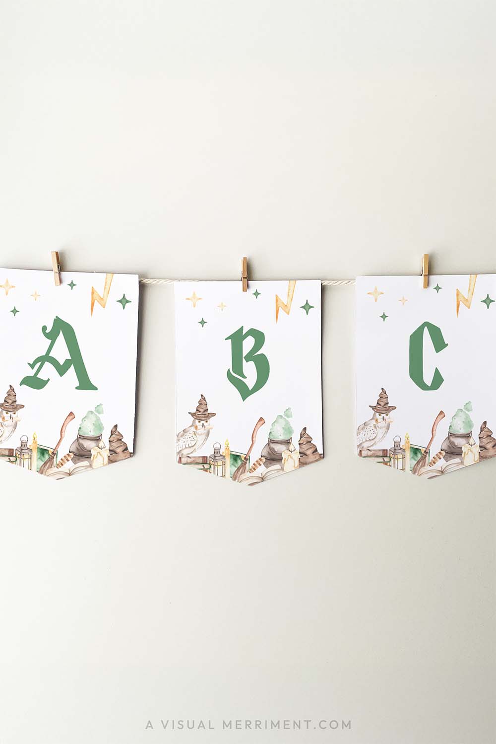 vertical ABC banner flags hanging with pegs in harry potter style with magic wizard school elements